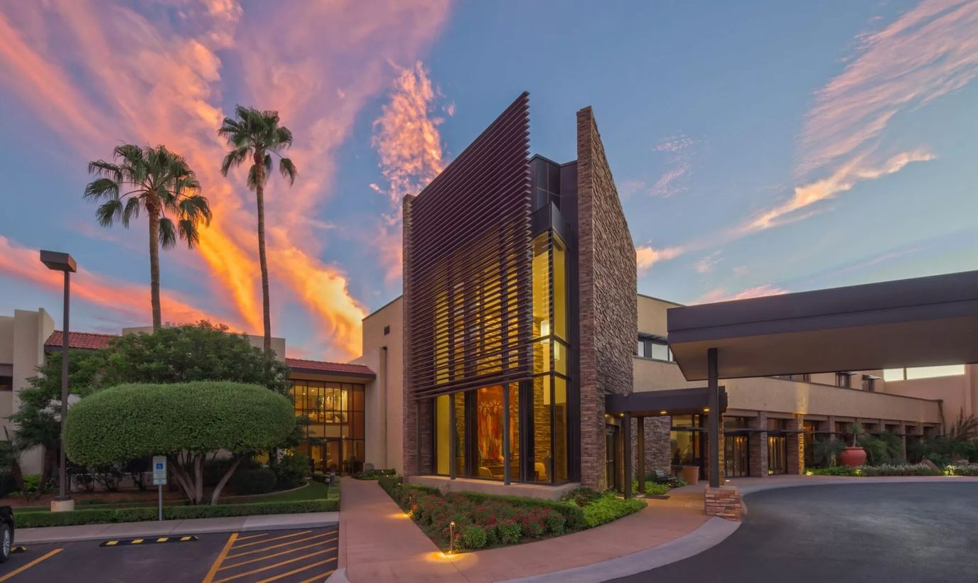 Building exterior of Westminster Village at sunset