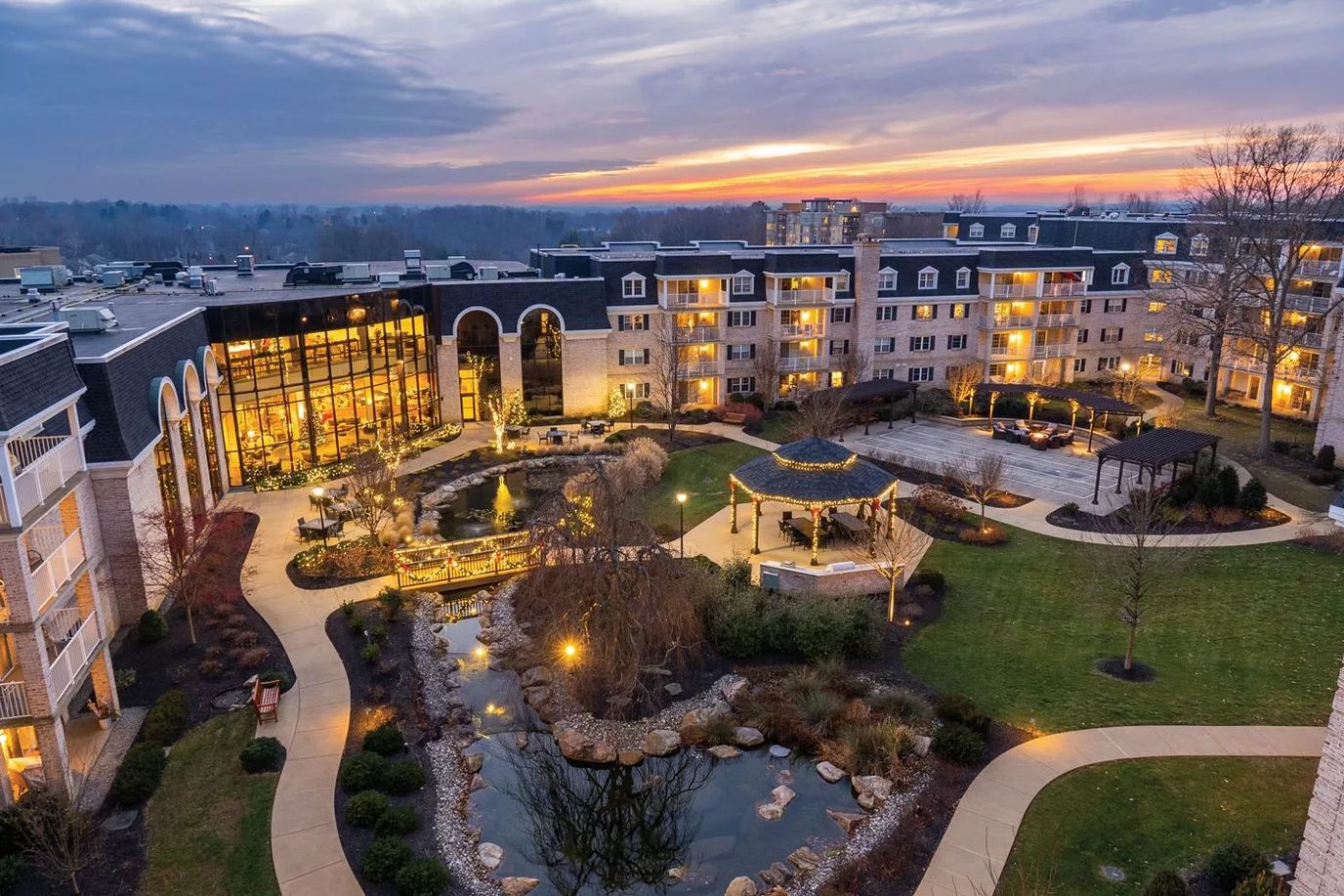 Aerial view of landscaped outdoor area at sunset