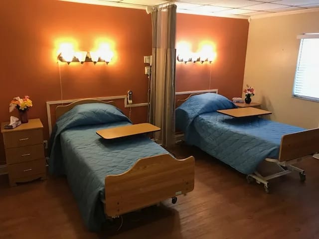 Private resident room with two beds and decorations