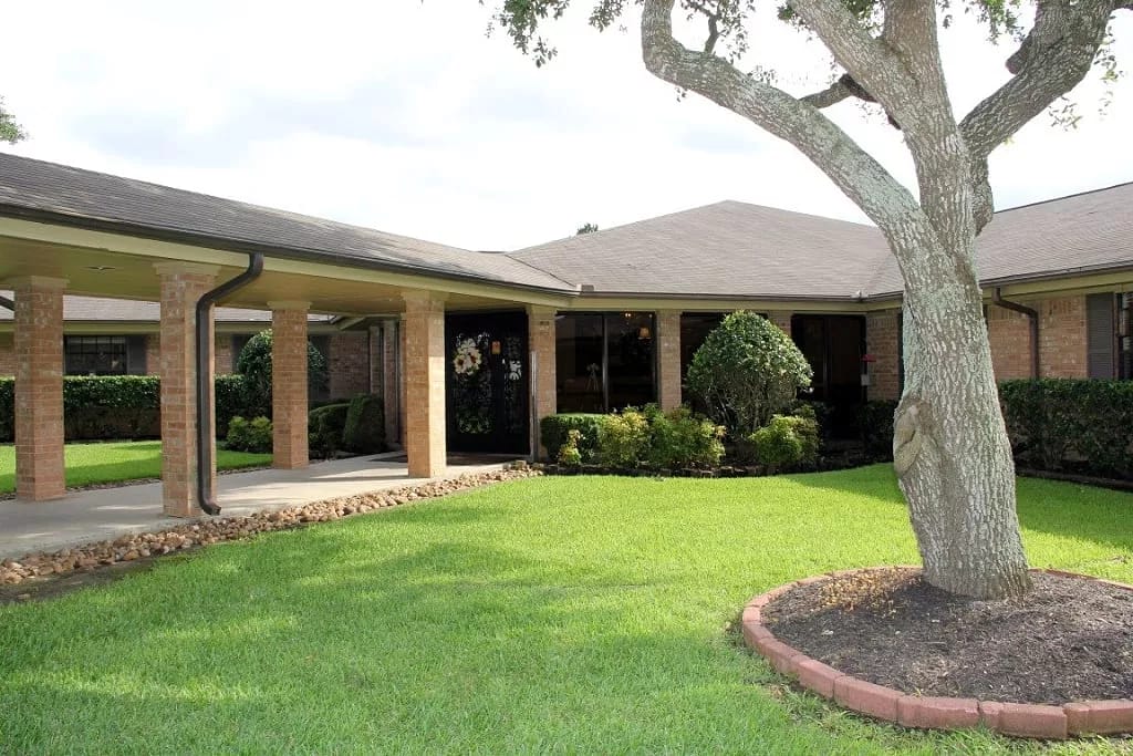 Exterior view of Baywind Village with landscaped lawn