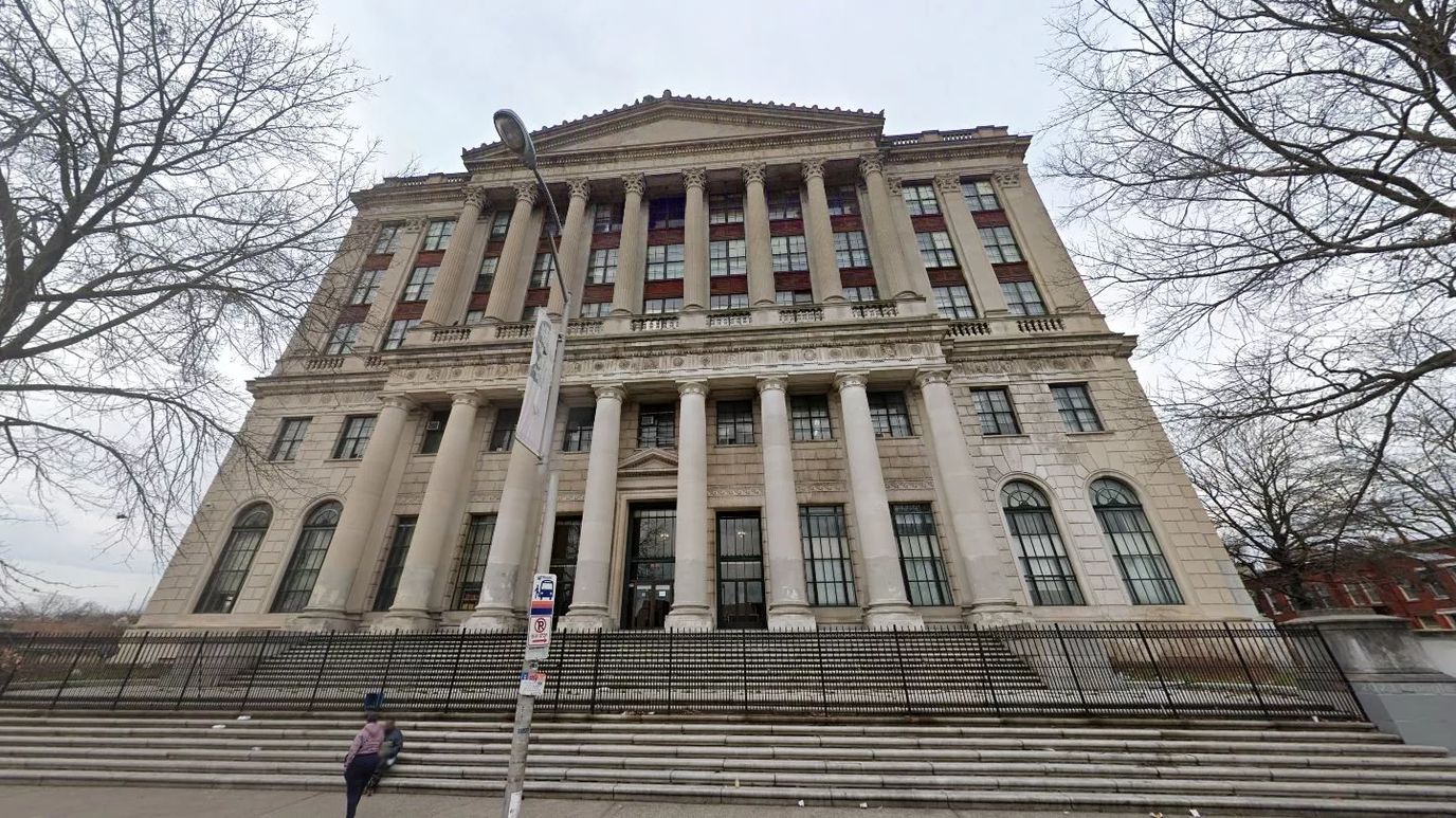 Exterior view of a historic building with columns