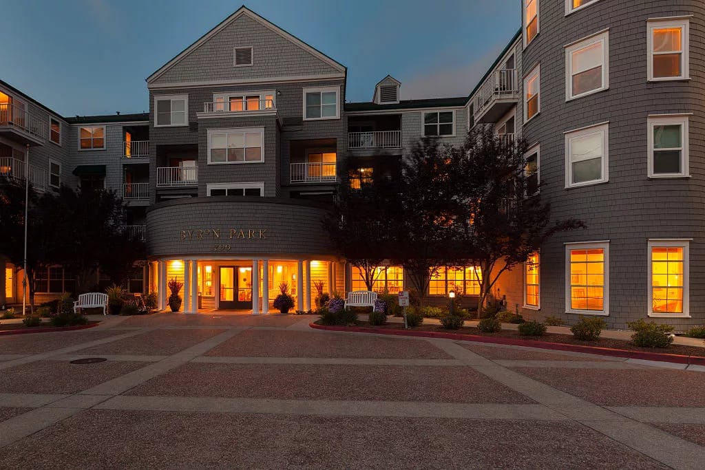 Exterior view of Byron Park at dusk with warm lighting