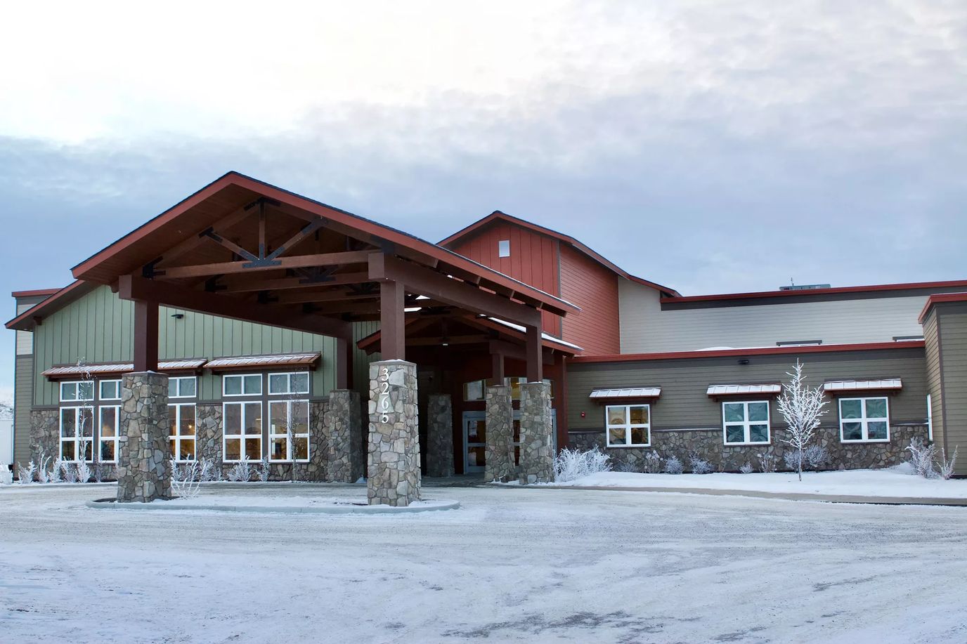 Front entrance of Maple Springs of Wasilla in winter