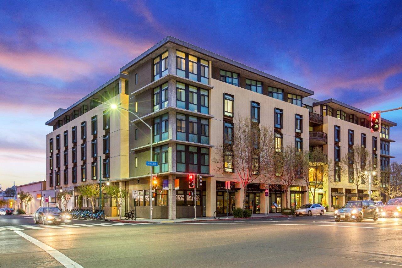 Modern assisted living facility exterior at dusk