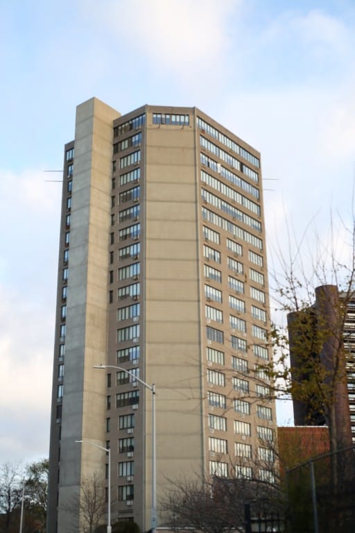 Exterior view of a tall senior living building