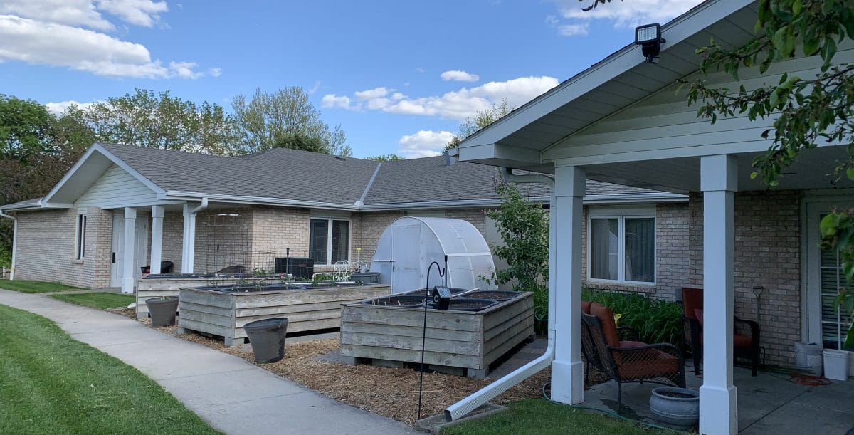 Exterior view of Orchard Park with outdoor gardens.