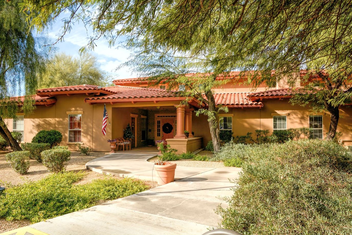 Exterior view of the facility entrance with landscaping