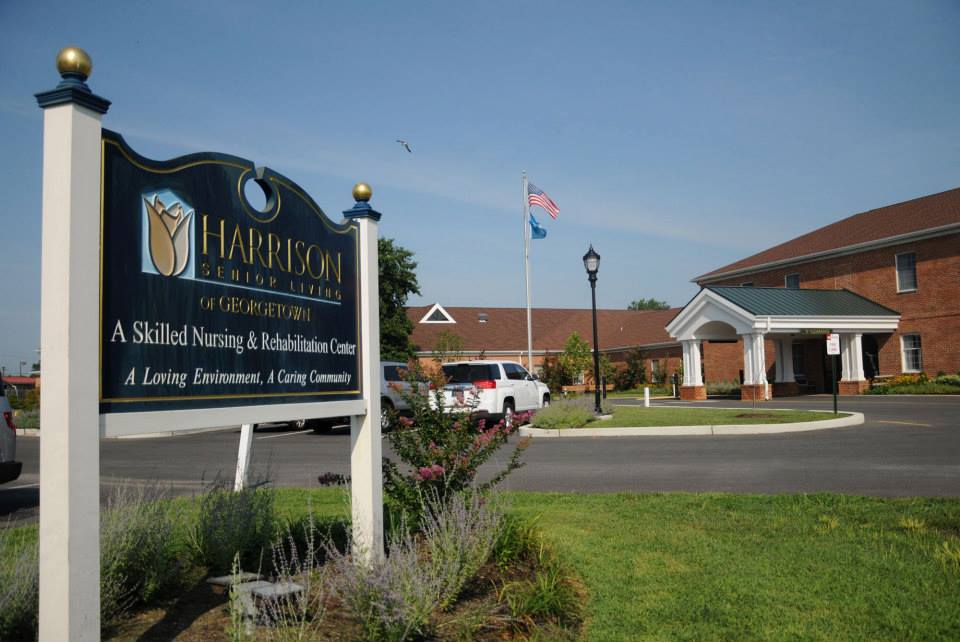 Exterior view of Harrison House nursing home sign and entrance