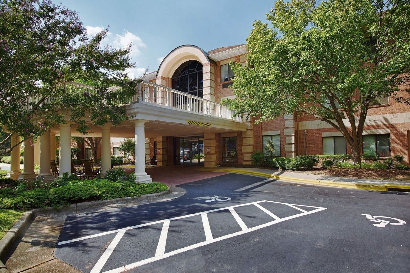 Exterior view of Independence Village with landscaping