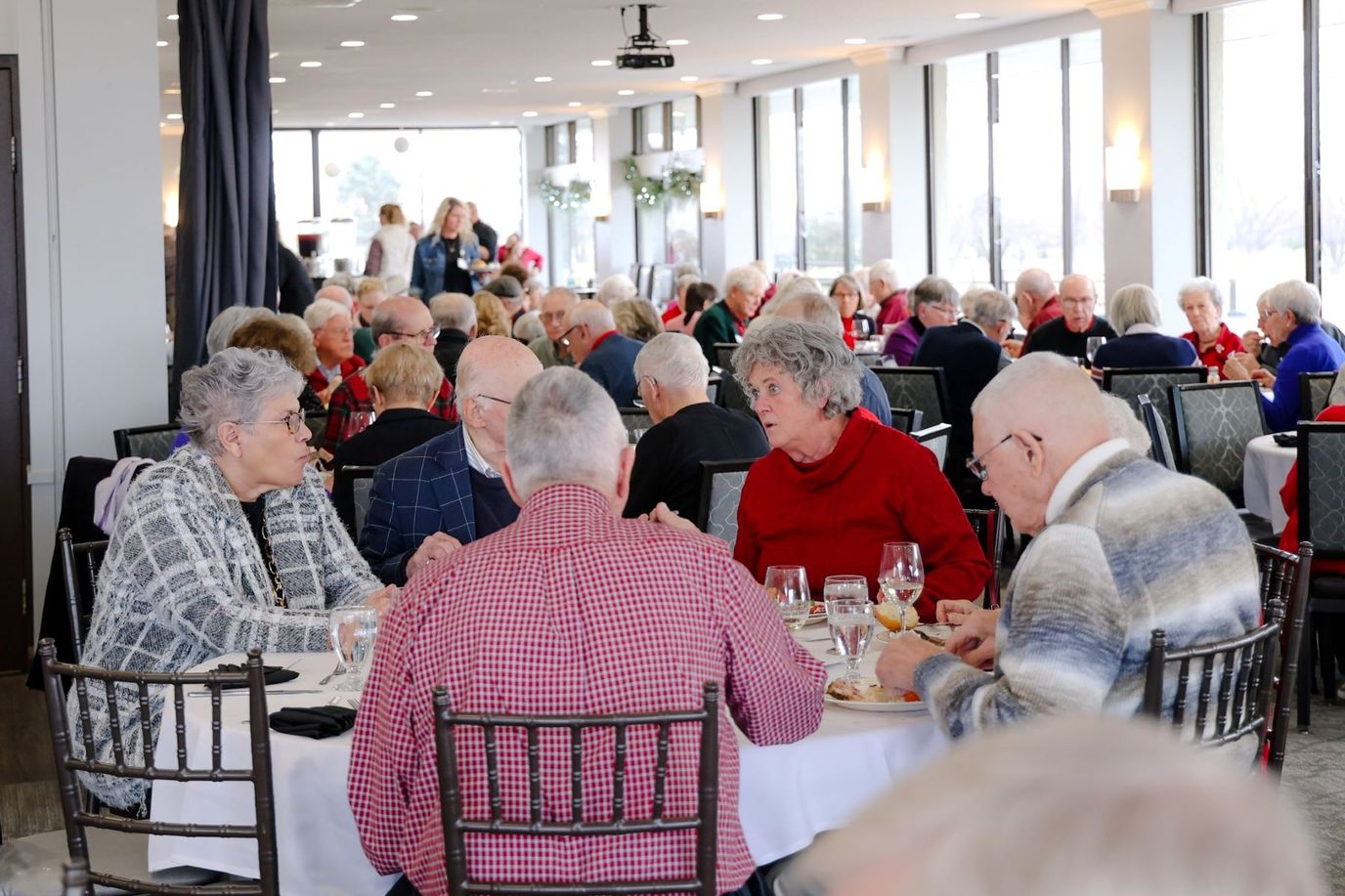 Residents enjoying a meal in the dining room
