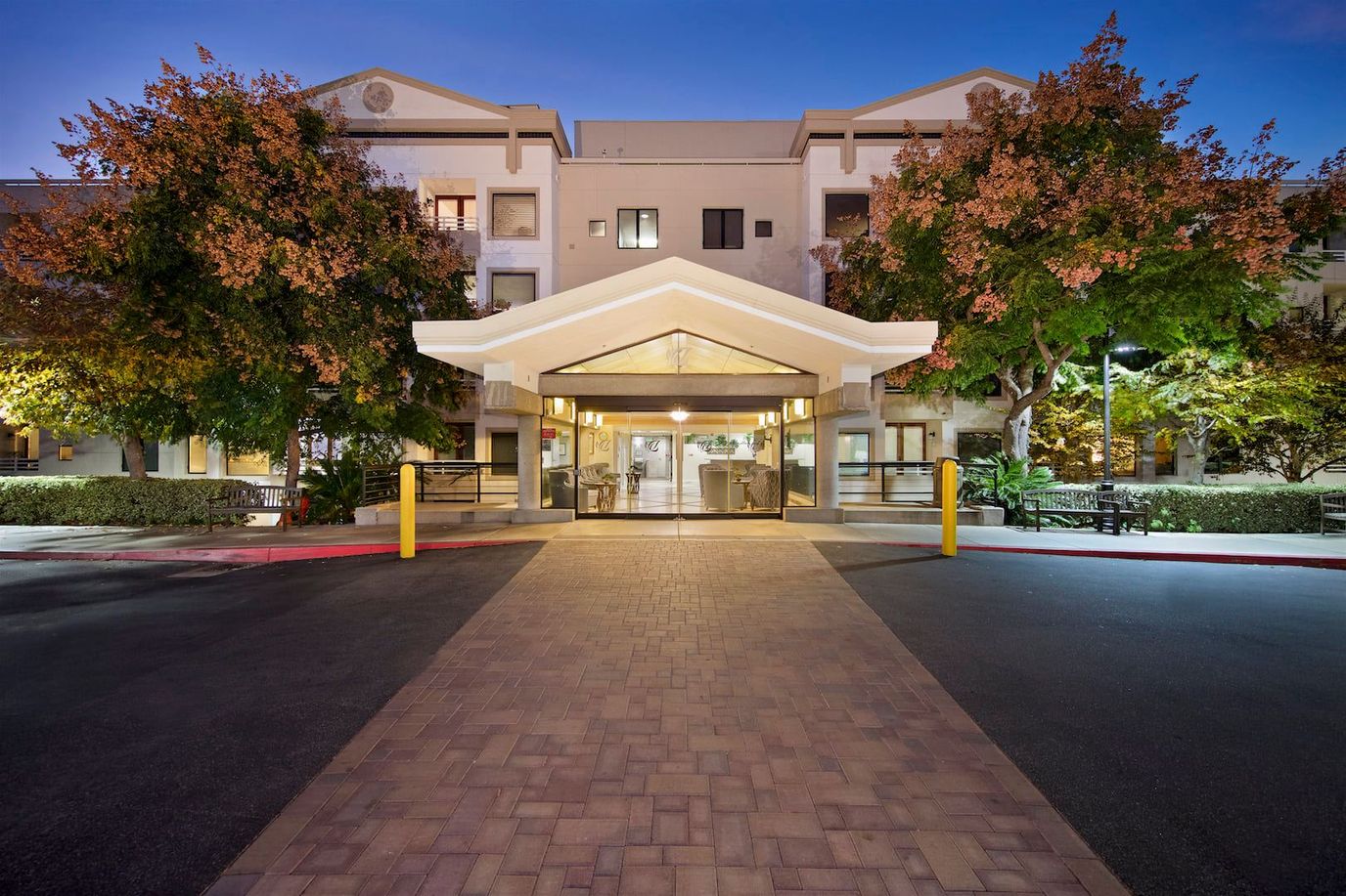 Main entrance of Sakura Gardens with landscaped area