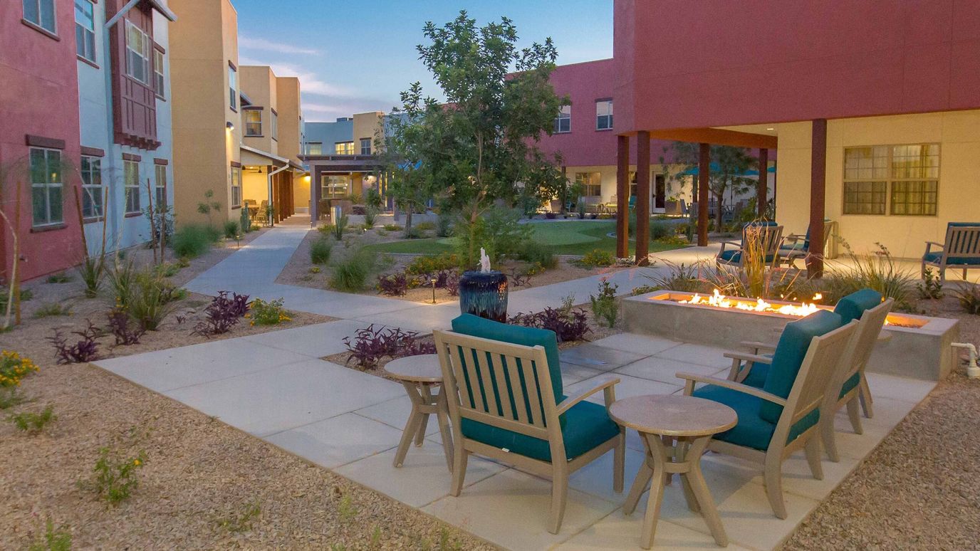 Beautifully designed outdoor seating area with fire pit
