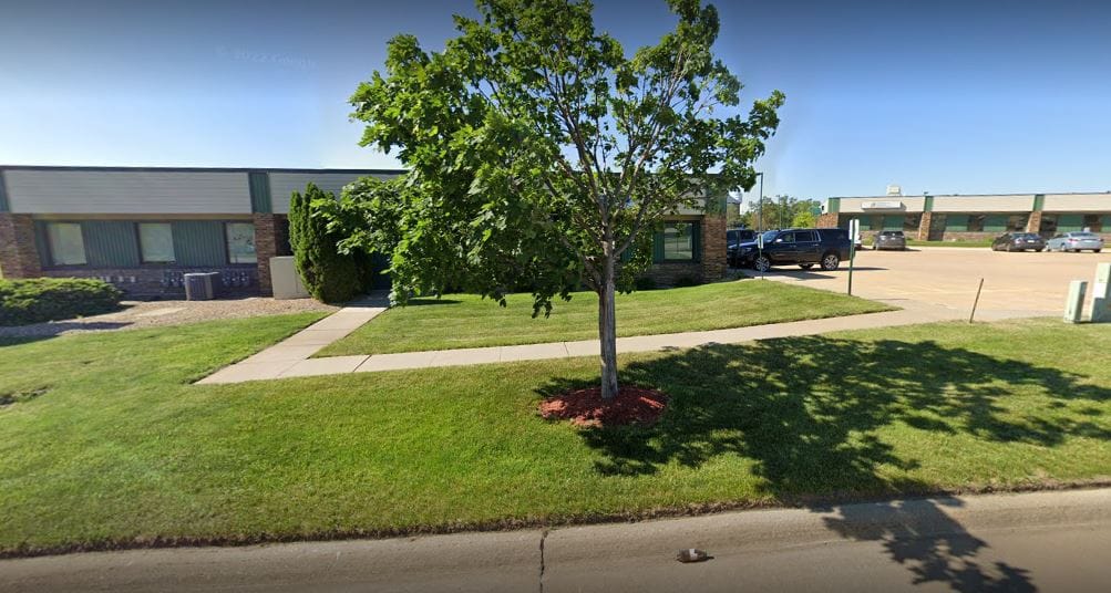Exterior view of the facility with green space