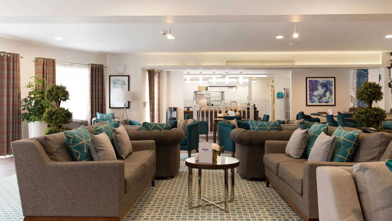 Bright lounge area with comfortable seating and decor