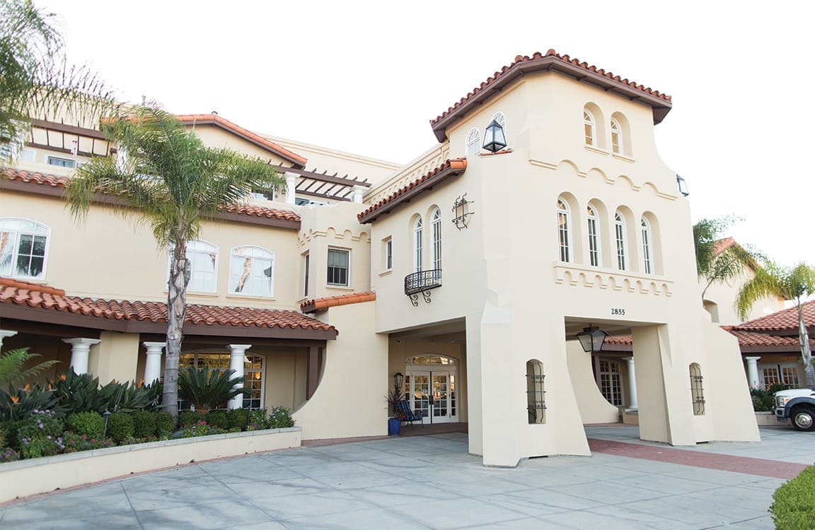 Exterior view of a senior living facility with architecture