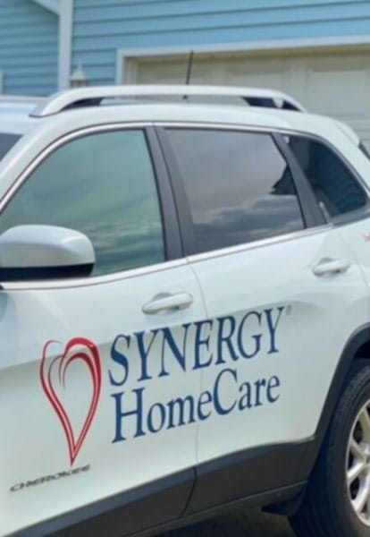 Vehicle with Synergy HomeCare logo