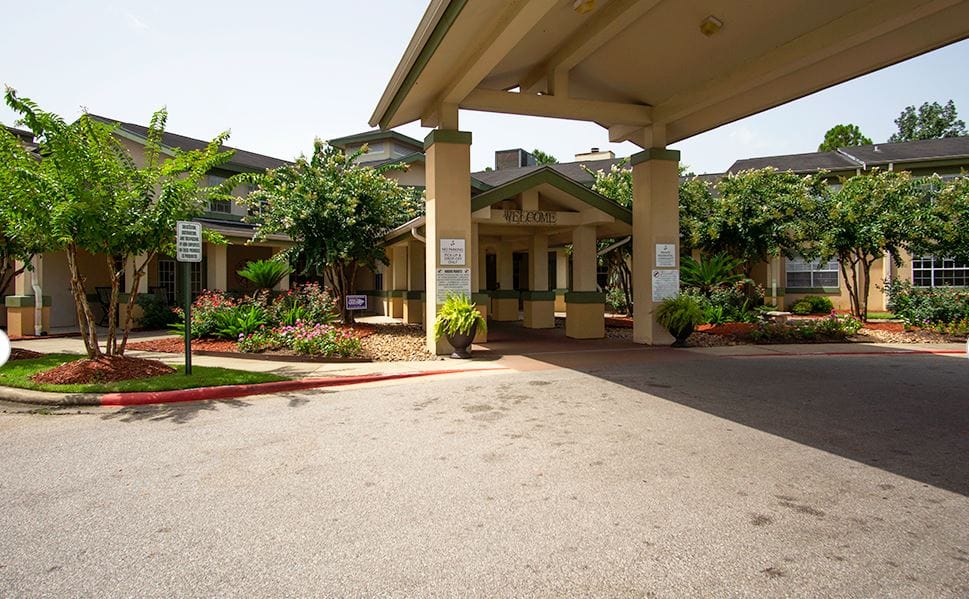 Entrance to Brookdale Dowlen Oaks with landscaping