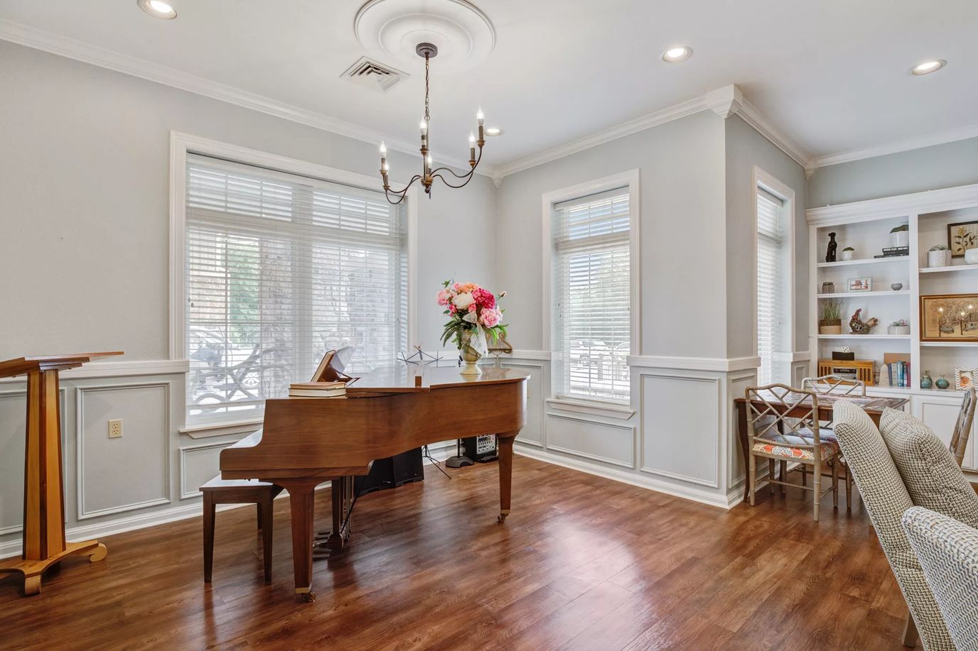 Bright common area with a piano and seating