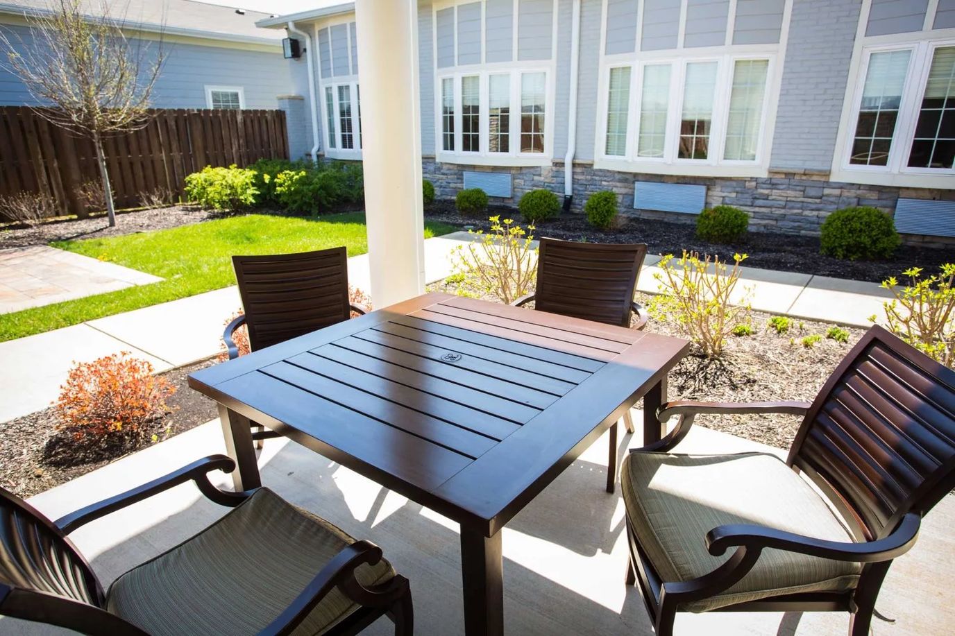 Outdoor seating area with a table and chairs