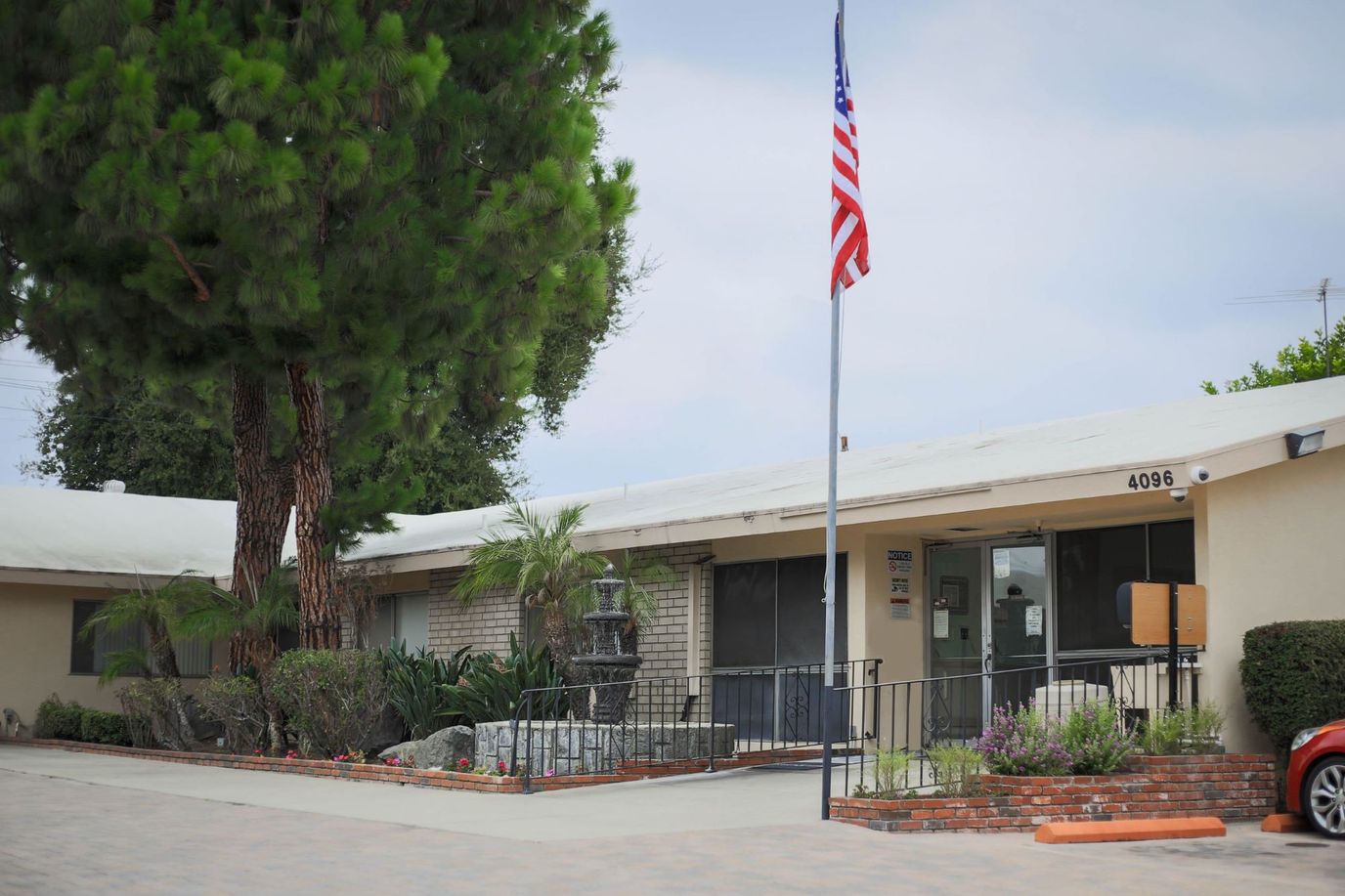 Exterior view of El Monte Convalescent Hospital with landscaping