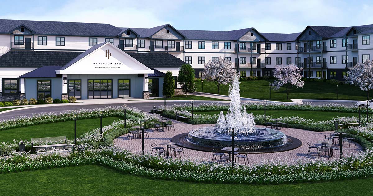 Exterior view of Hamilton Parc with fountain and gardens