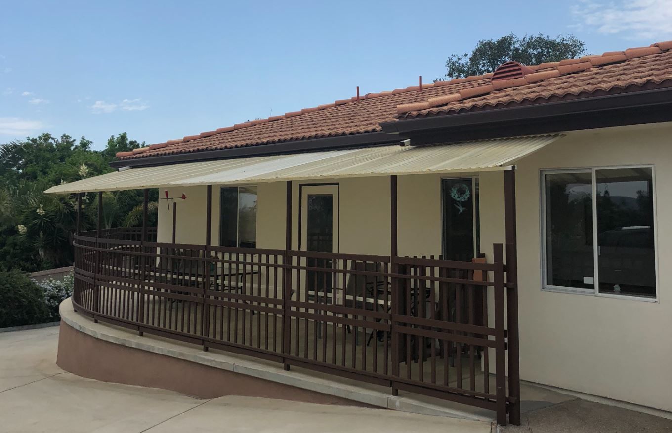 Exterior view of facility entrance with awning