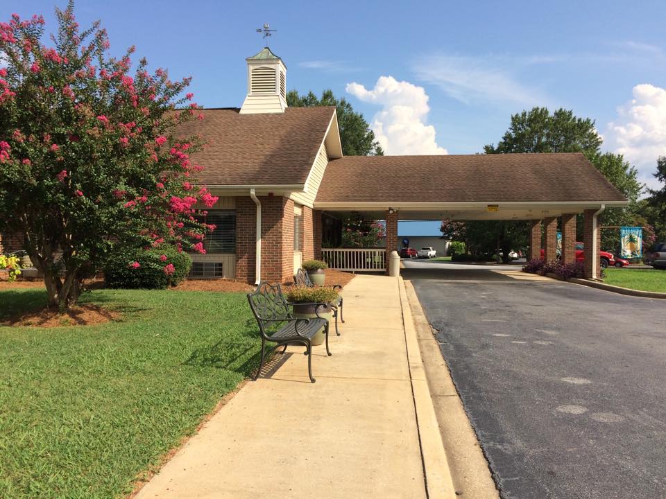 Exterior view of Magnolia Manor Greenwood entrance