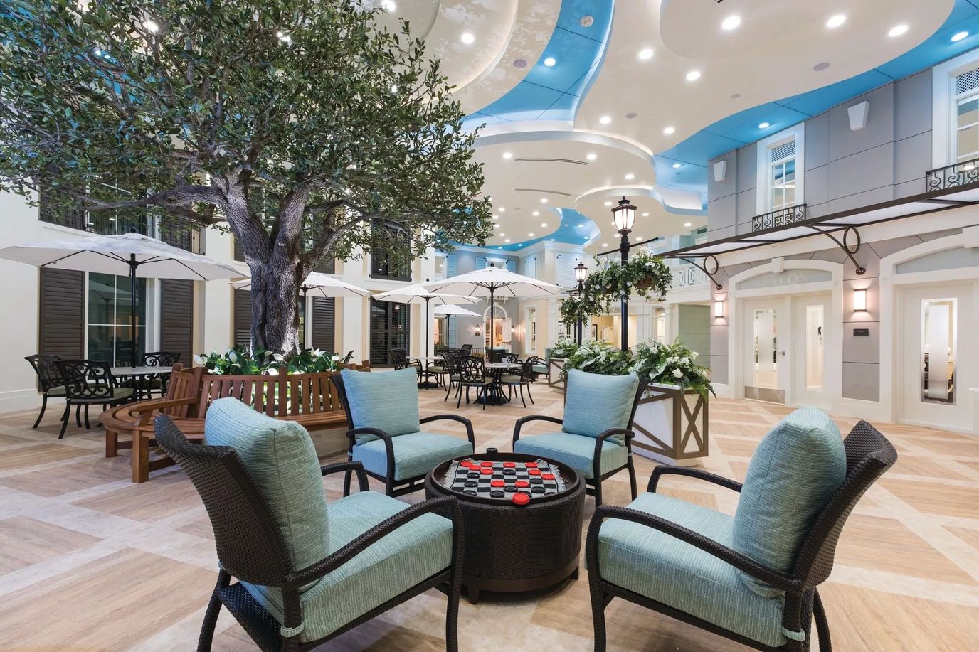 Interior common area with seating and trees