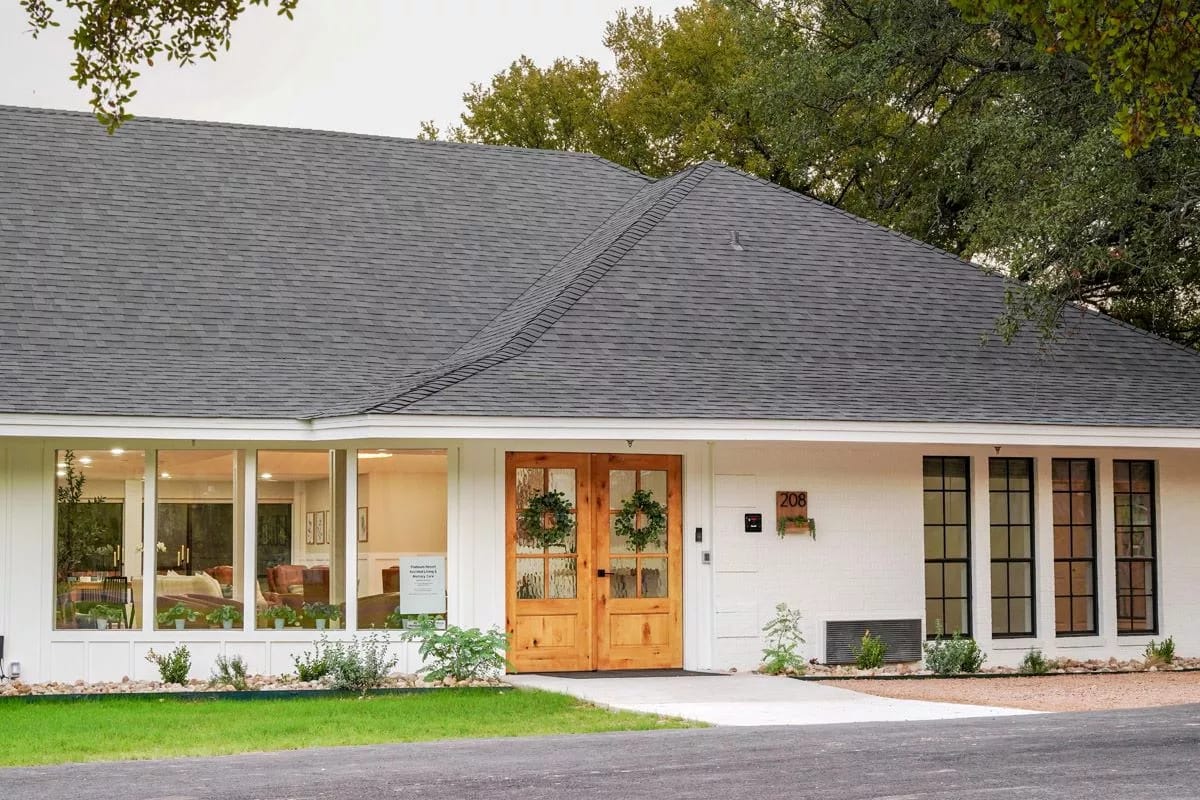 Exterior view of the assisted living facility with front entrance