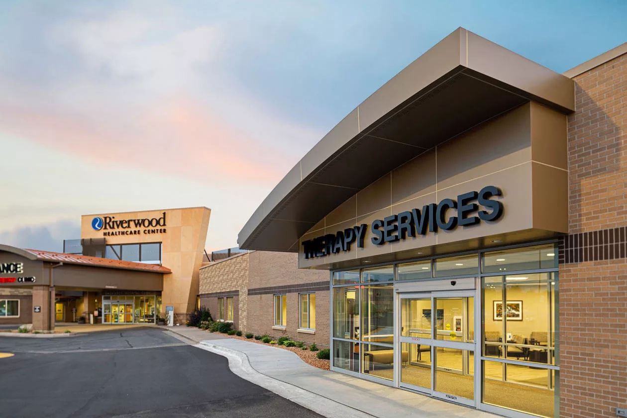 Exterior view of Riverwood Healthcare Center with therapy services entrance