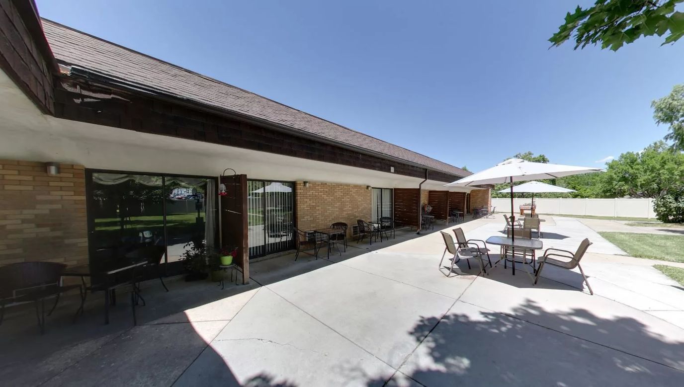 Exterior view of patio seating area at the facility
