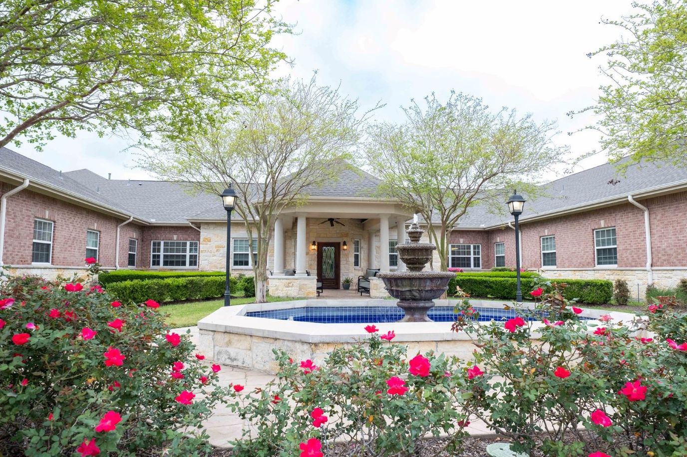 Beautiful outdoor courtyard with fountain and flowers