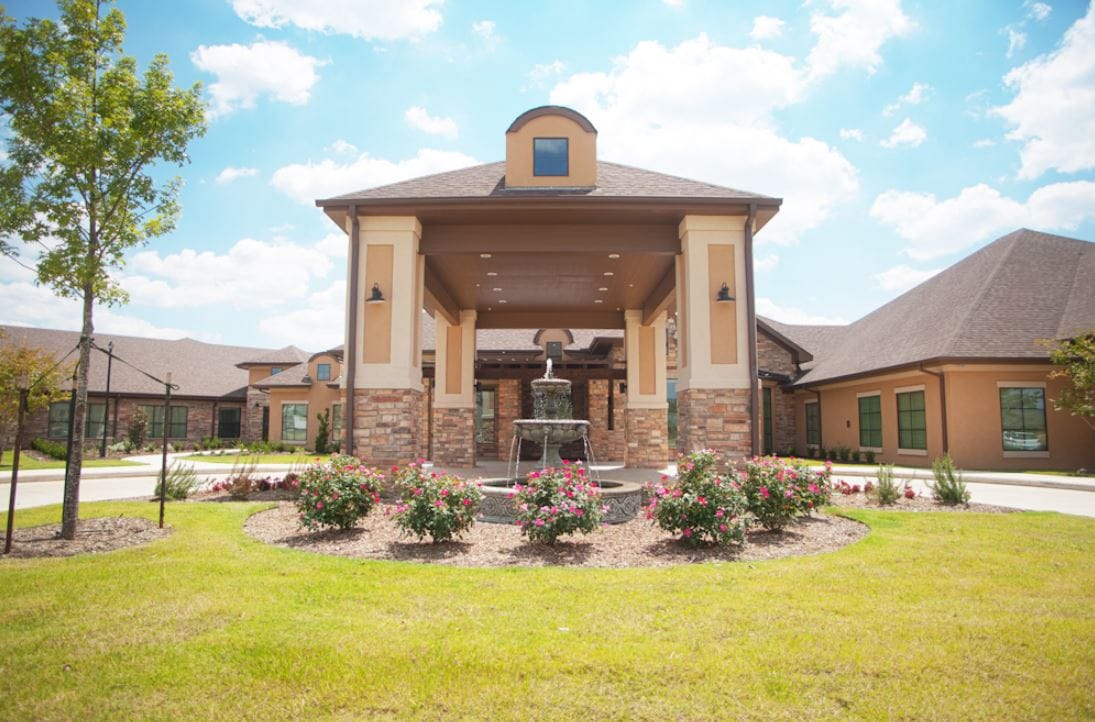Front view of the Treviso Transitional Care facility with landscaped gardens