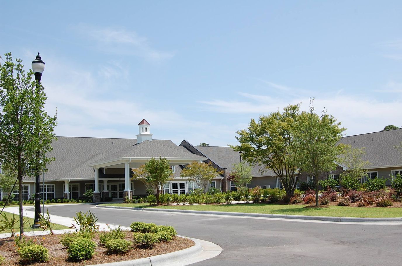 Exterior view of a senior living facility entrance