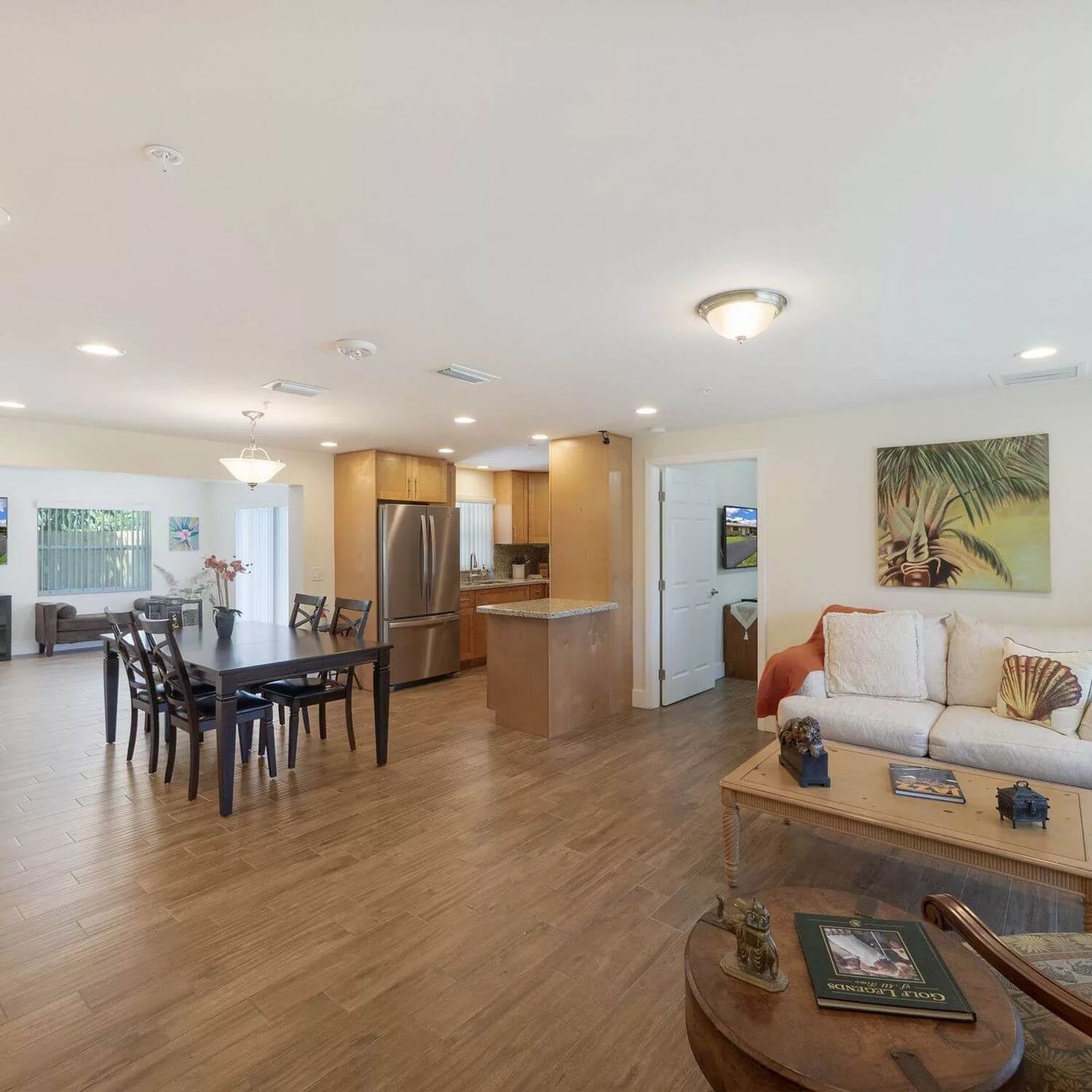Bright common area with dining space and living room