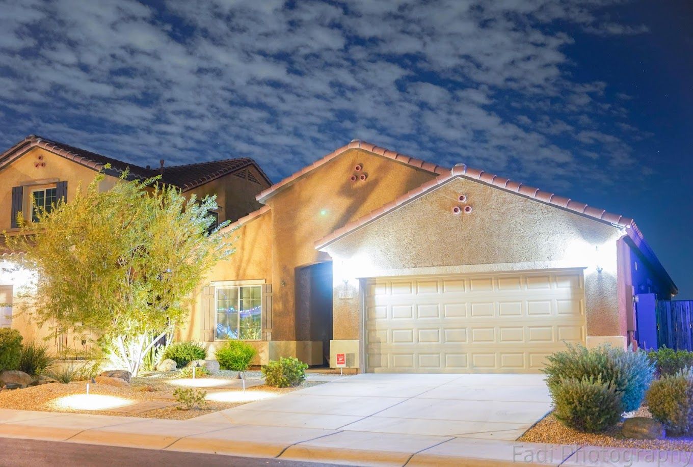 Exterior view of a residential building at night