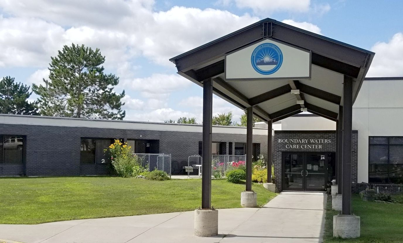 Front entrance of Boundary Waters Care Center with landscaping