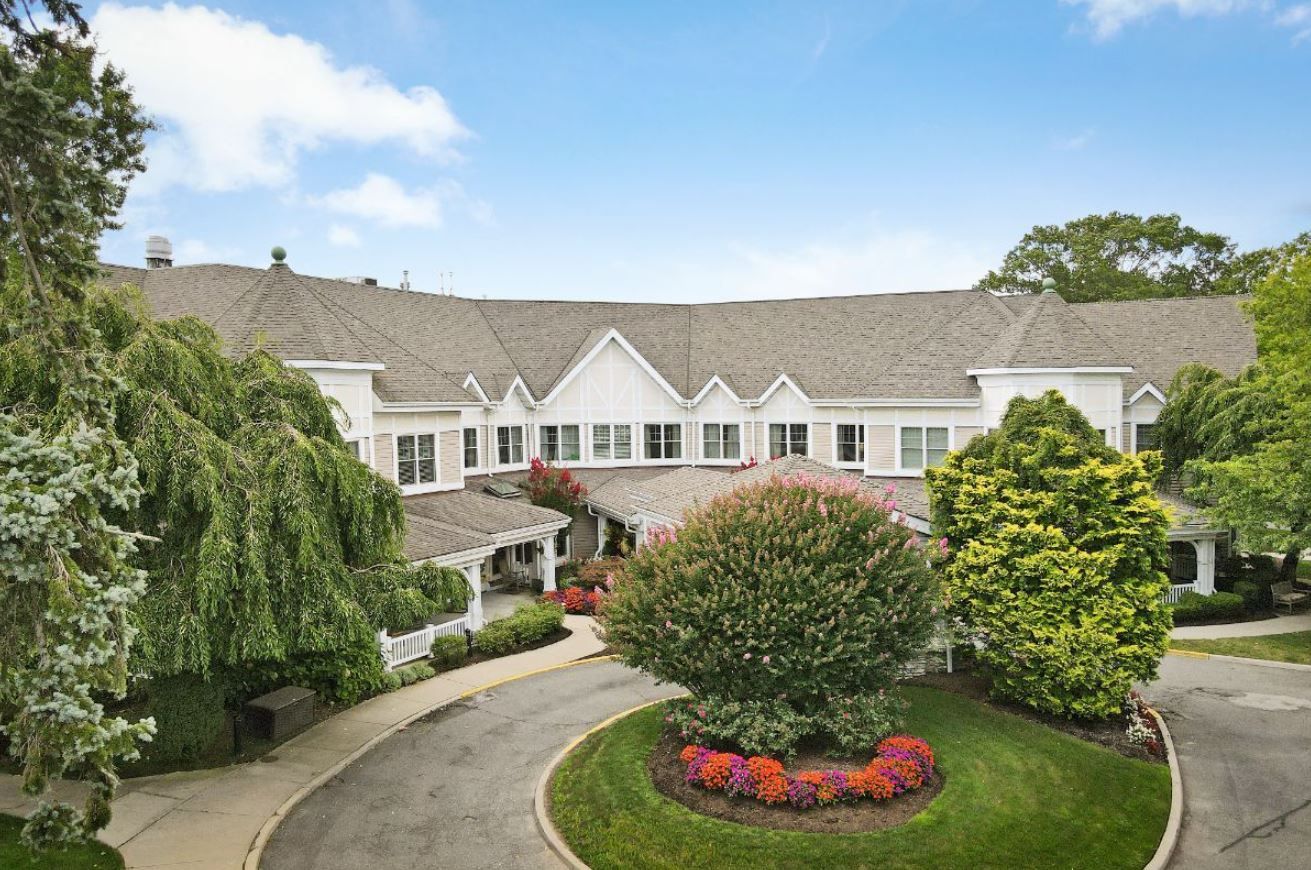 Aerial view of the facility's exterior with landscaped gardens