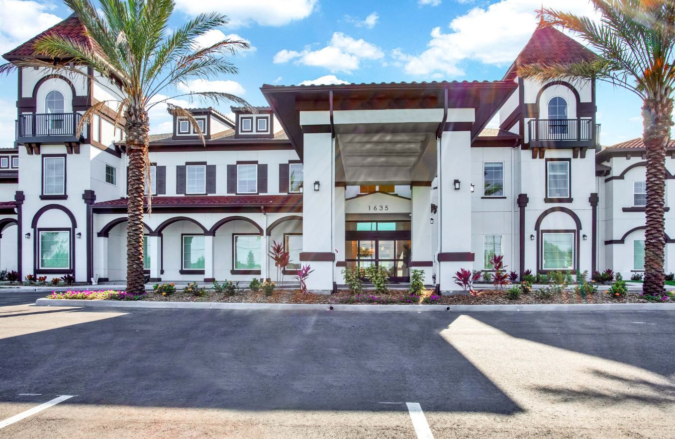 Exterior view of The Blake at LPGA with palm trees