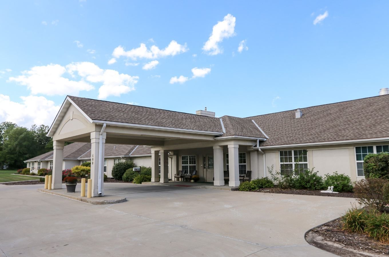 Front entrance of the assisted living facility with a covered area
