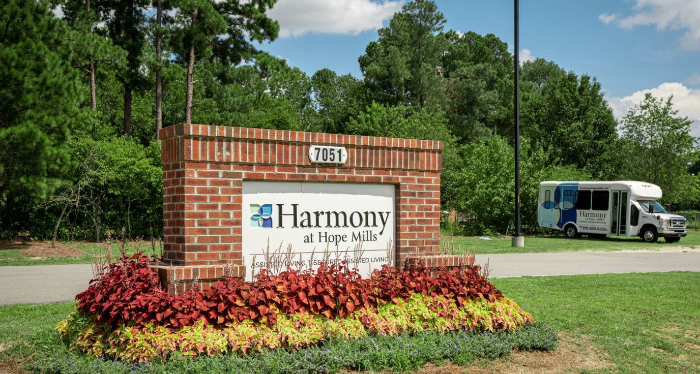 Exterior sign of Harmony at Hope Mills facility