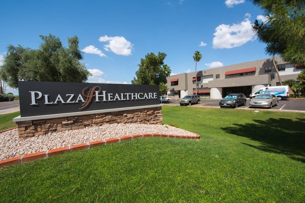 Exterior view of Plaza Healthcare building and sign