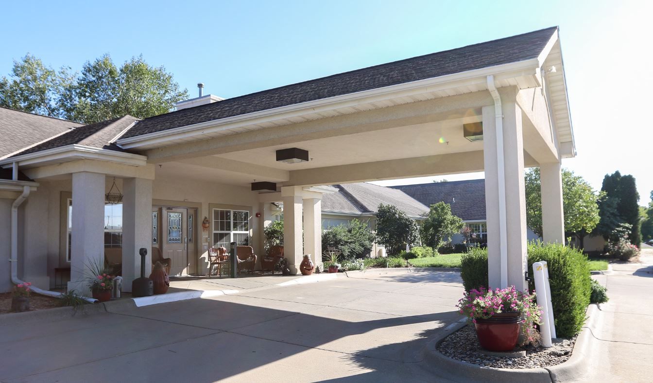 Entrance of the Homestead of Wamego with outdoor seating