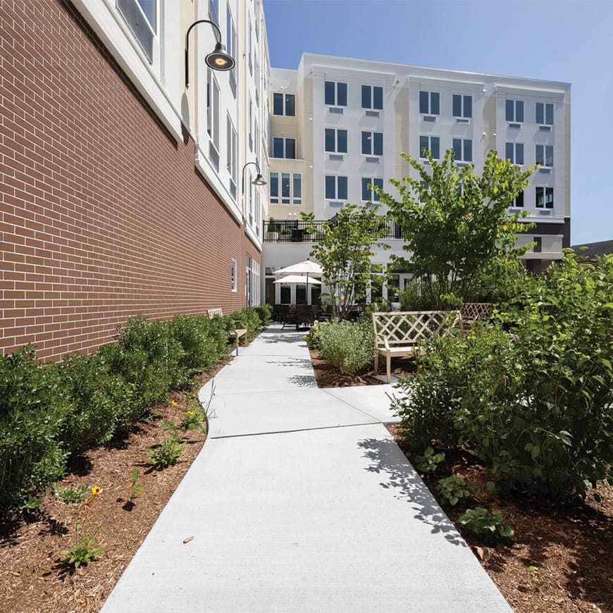 Pathway leading to garden area of the facility.