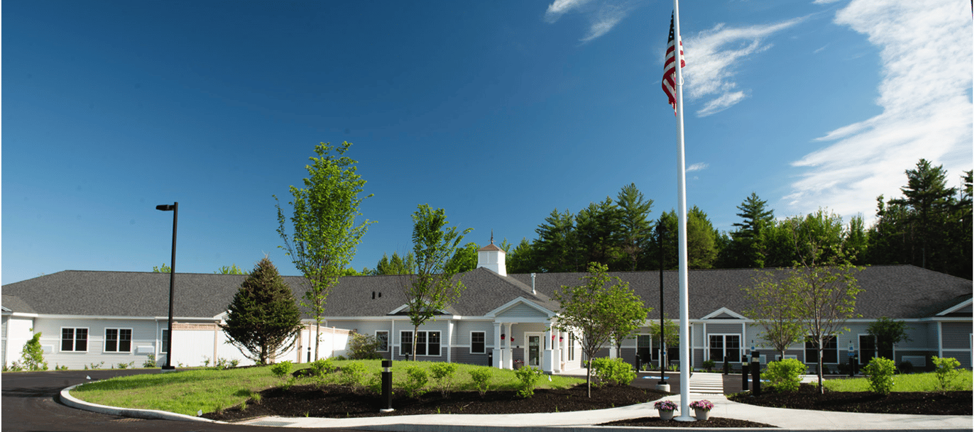 Exterior of a senior living facility with landscaping