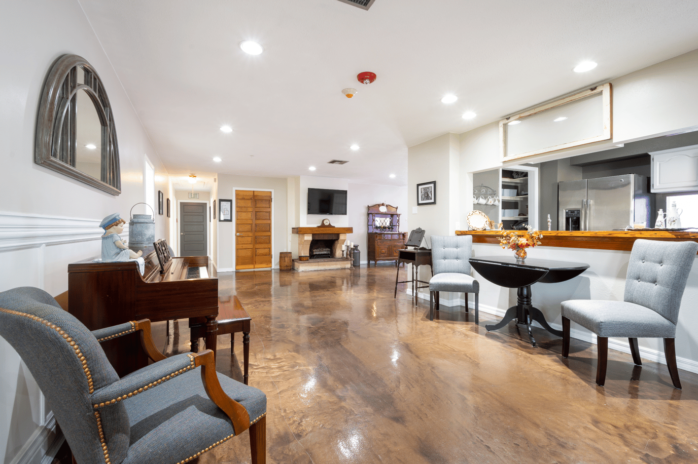 Interior common area with seating and piano