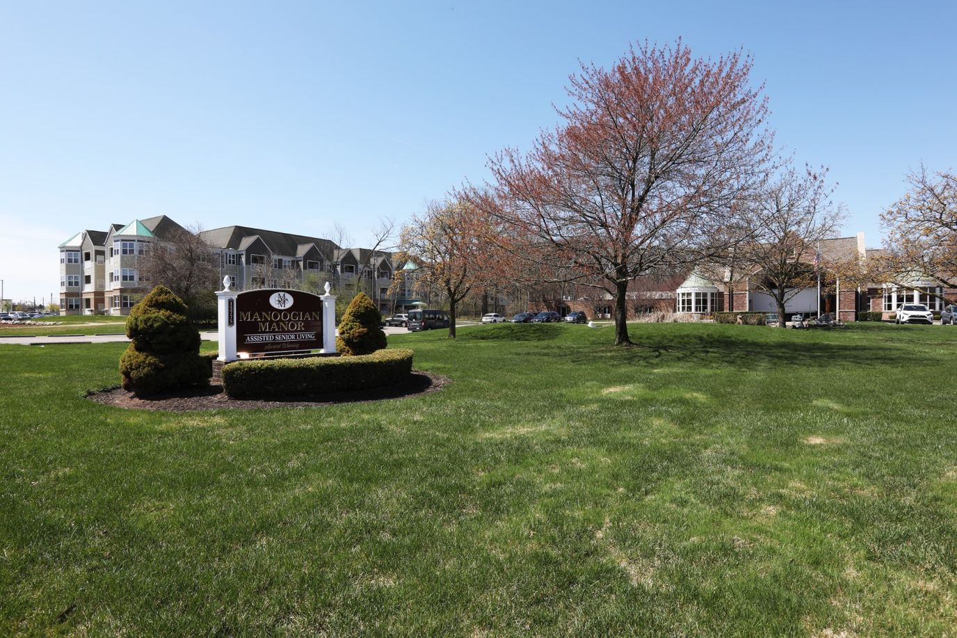Exterior view of Manoogian Manor with landscaping