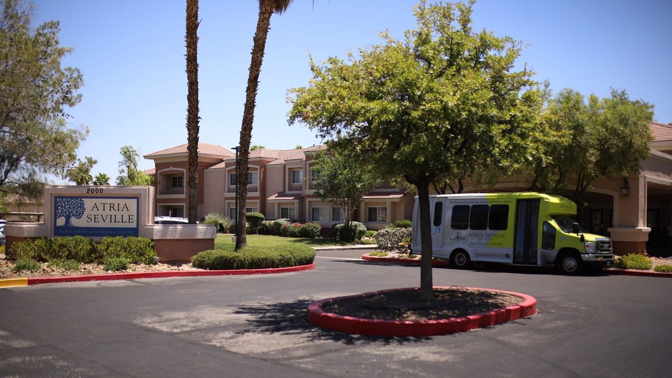 Exterior view of Atria Seville with facility sign
