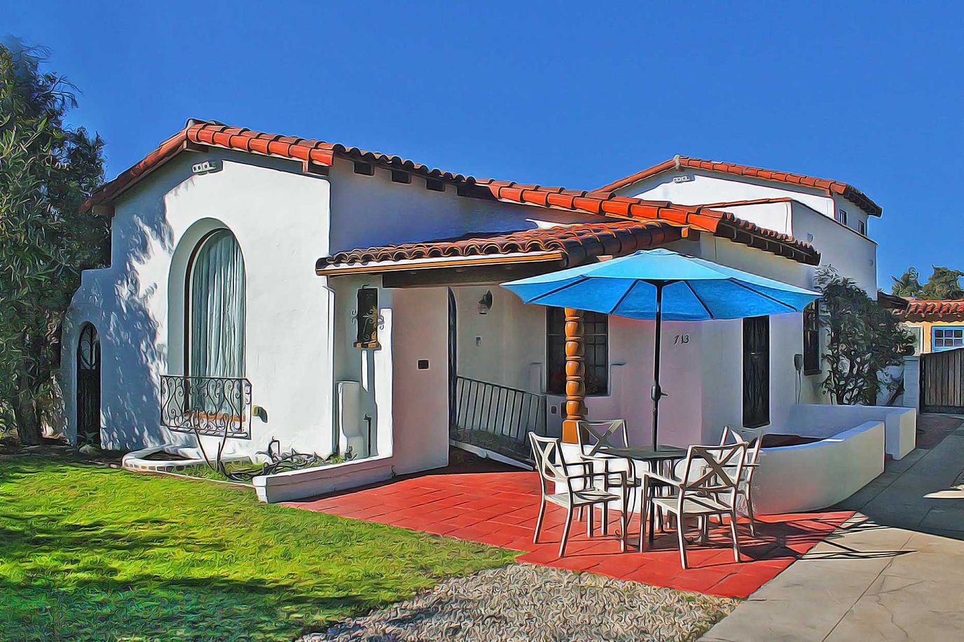 Exterior view of a residential care facility with outdoor seating