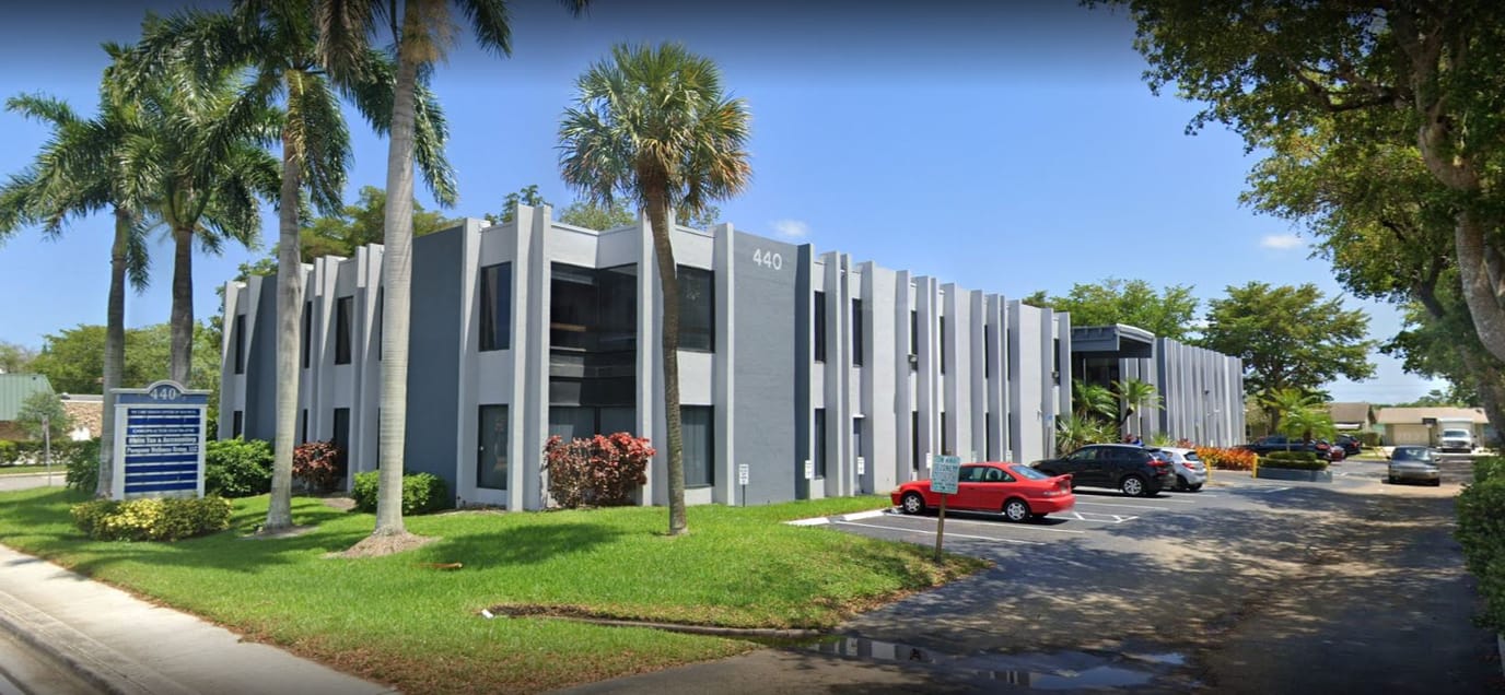 Exterior view of Affinity Home Care building with landscaping and parking
